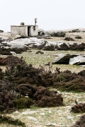 mountain hut and signpost