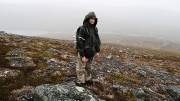 after abandoning the attempt to summit Giron (1543m) in the relentless rain, on the north ridge with Abiskojaure lake below, Abisko NP, Sweden