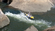 running the rapid in a completely unsuitable canoe Rio Xallas, Â©Anxo